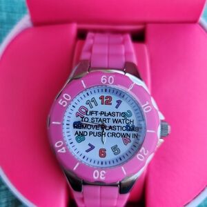 Issac Mizrahi LIVE pink watch with colorful numbers.